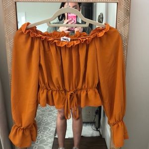 About us off the shoulder top